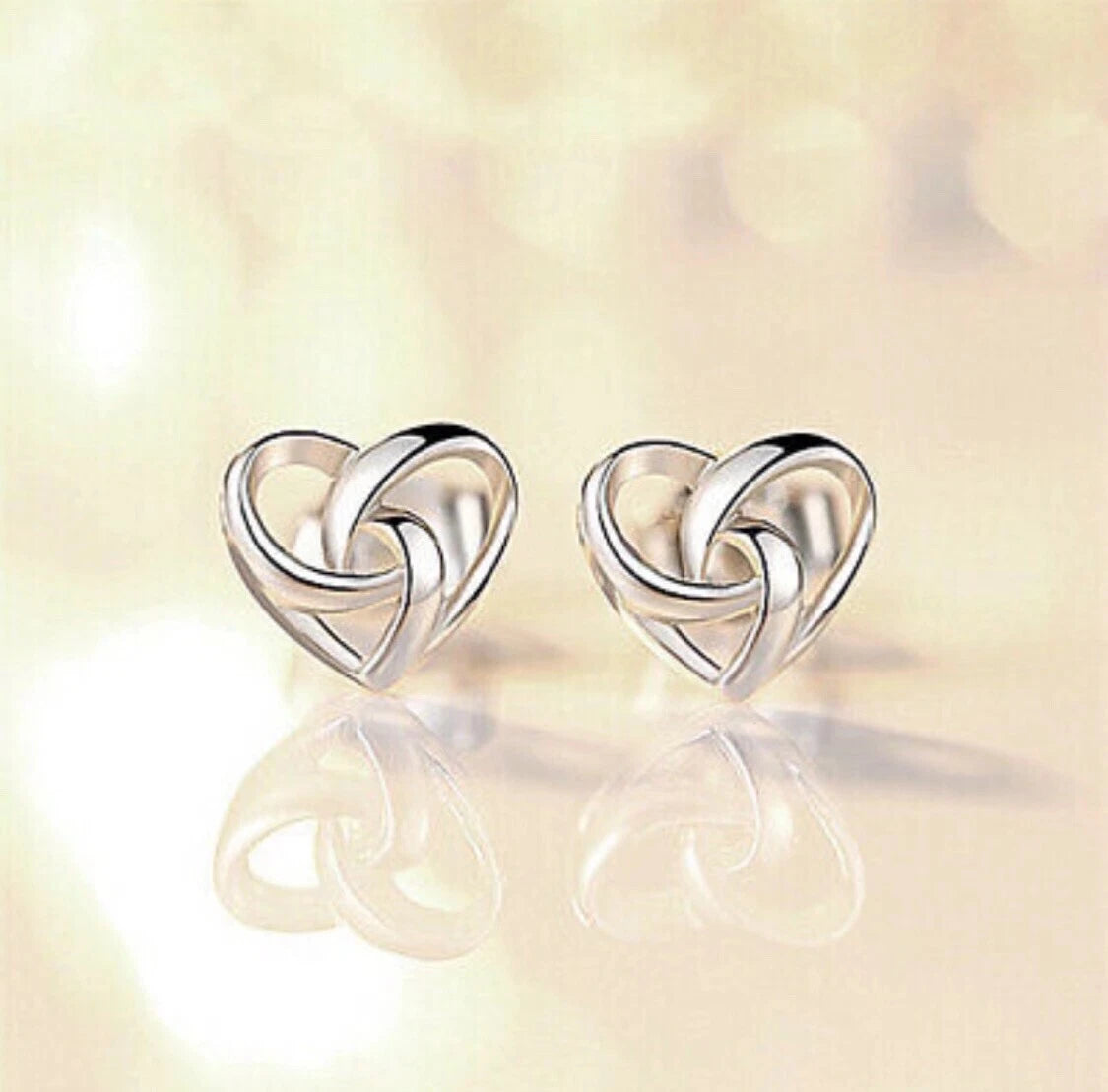 Stunning Swirl Heart Sterling Silver Stud Earrings